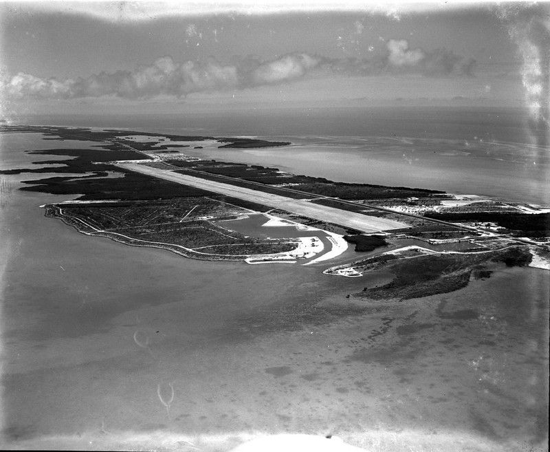 Aerial vioew of an island with a runway.