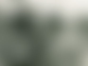 two men standing with their arms around each other's shoulders