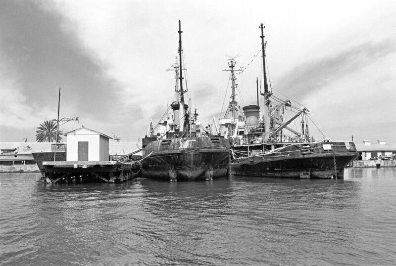 Two large vessels at dock.