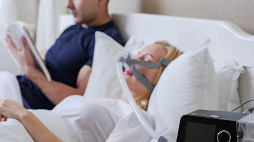 Eye-level view of a nebulizer machine set up on a bedside table