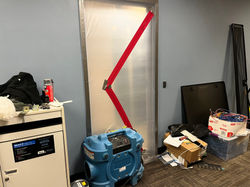 containment barrier with air filtration device on a mold remediation project