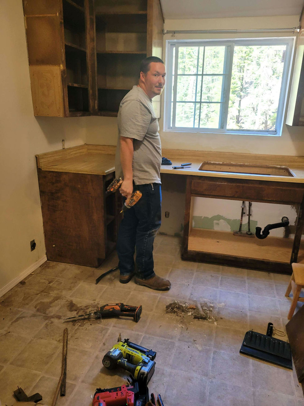 reinstalling the cabinets and countertop