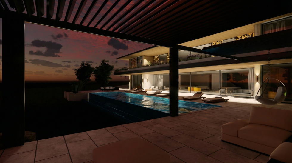 Night view from the outdoor lounge of Villa Tiffany, with illuminated pool and warm atmosphere.
