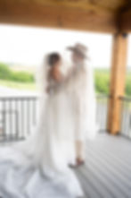 couple holding each other on balcony