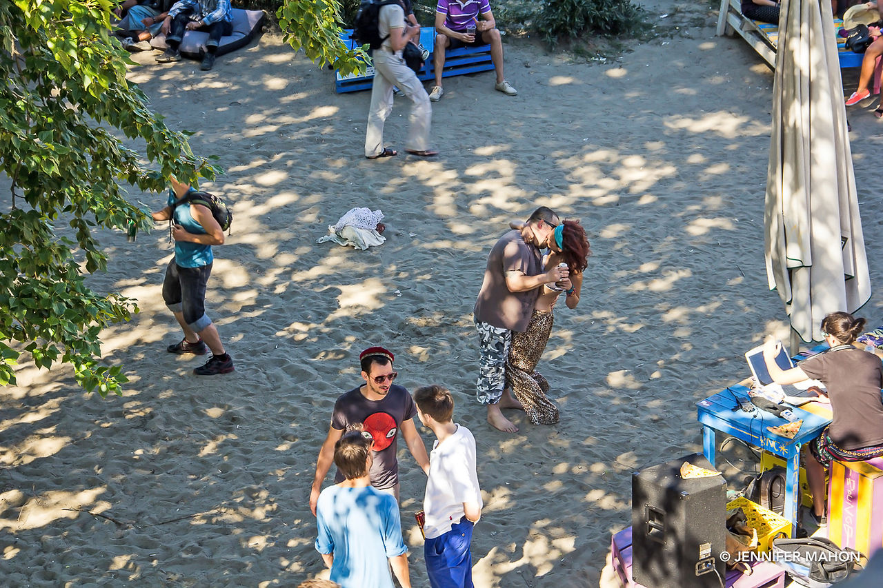 People chillin' by the Danube on a sunny afternoon