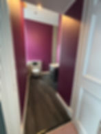 Purple bathroom painted by painters and decorators edinburgh