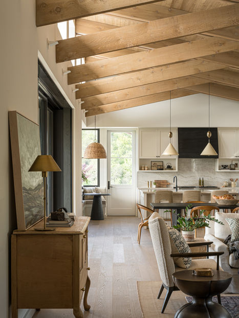 Living room and kitchen interior with wooden beams