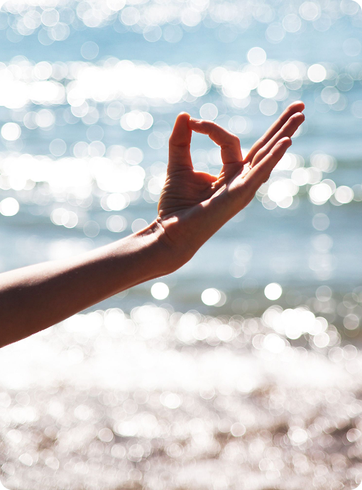 Hand resting in a meditation mudra during a yoga practice