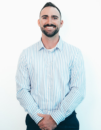 Dr. Luke Orr, chiropractor at the Real Health Co, smiling.