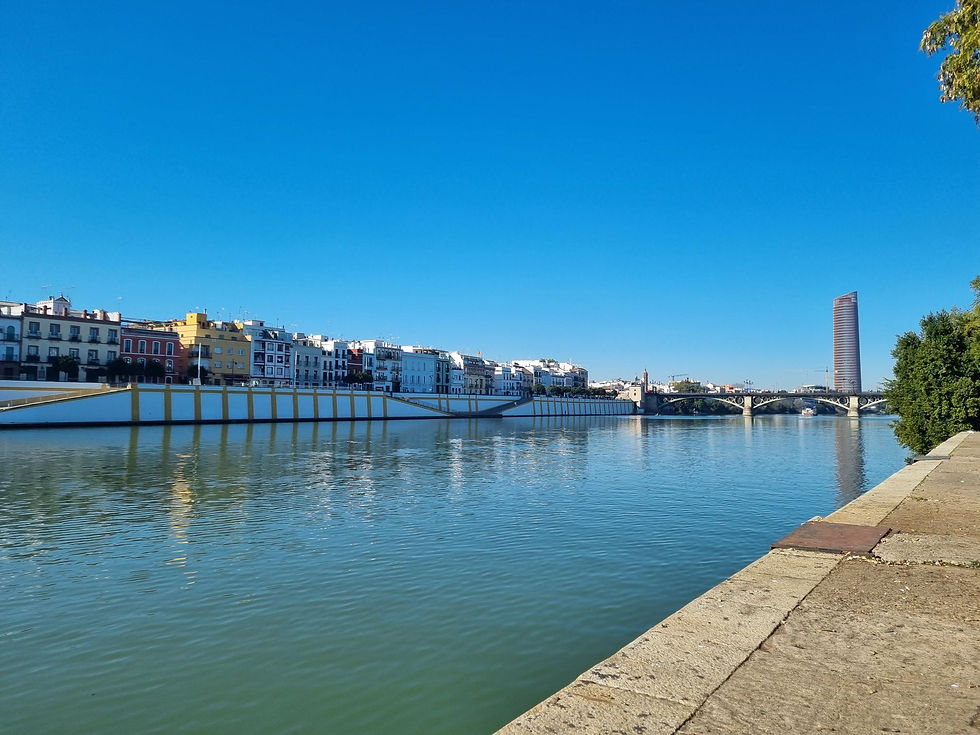 Triana across the river