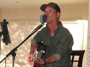 Local musician Bubba Plauche' performing live with his guitar, delivering a heartfelt set of country tunes. (Photo courtesy of Bubba Plauche')