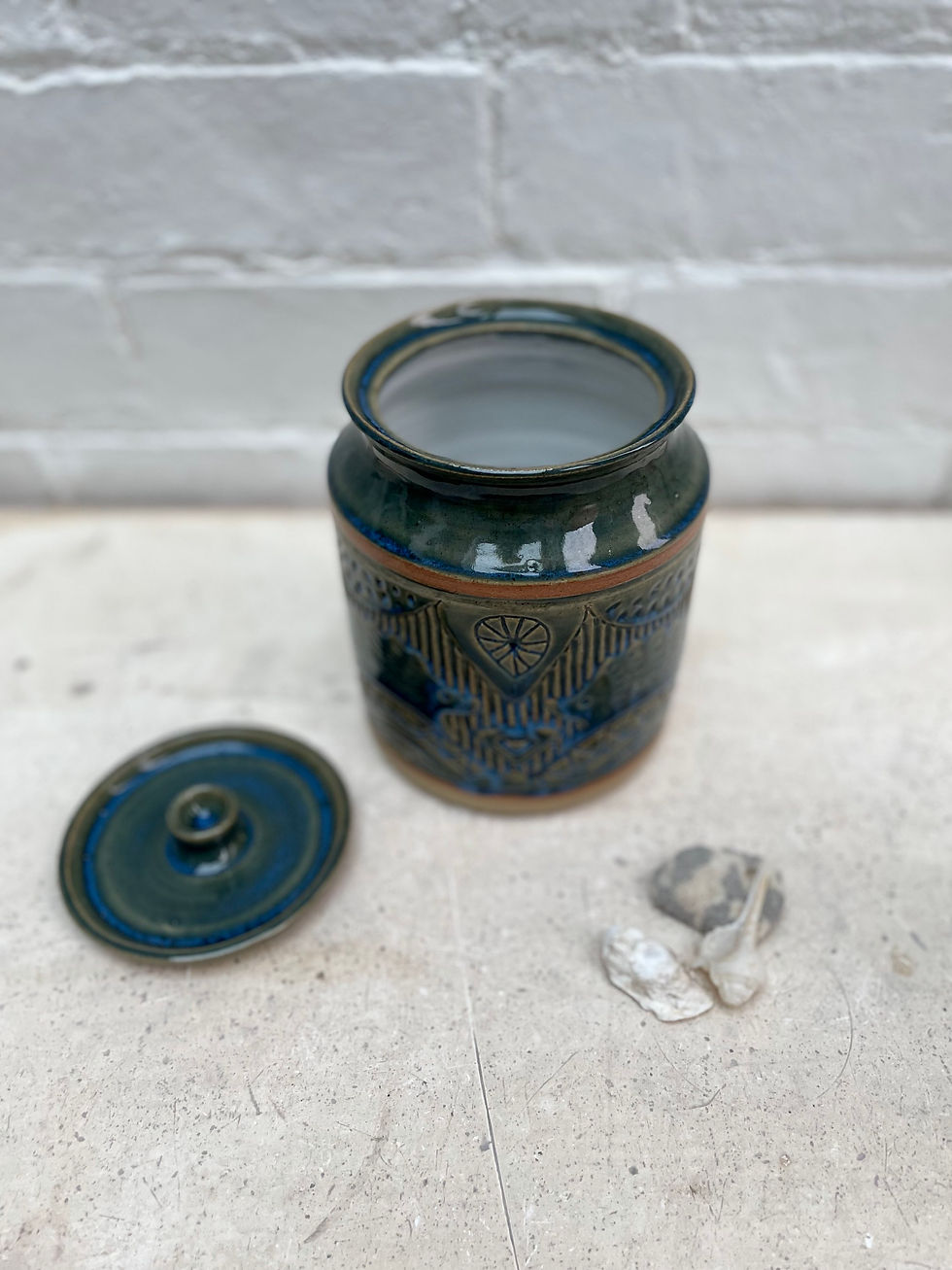 Thumbnail: Storage Jar with carved woodland animal and fruit designs