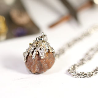 Unique necklace with fossilized shell 