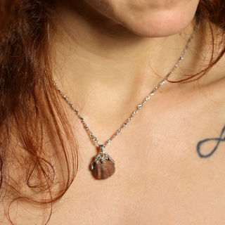 Unique necklace with fossilized shell