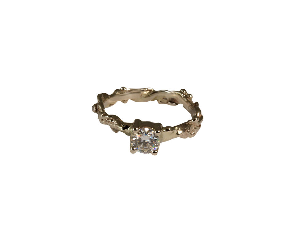 Solitaire gold twisted band engagement ring