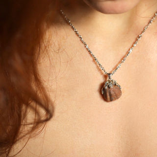 Unique necklace with fossilized shell