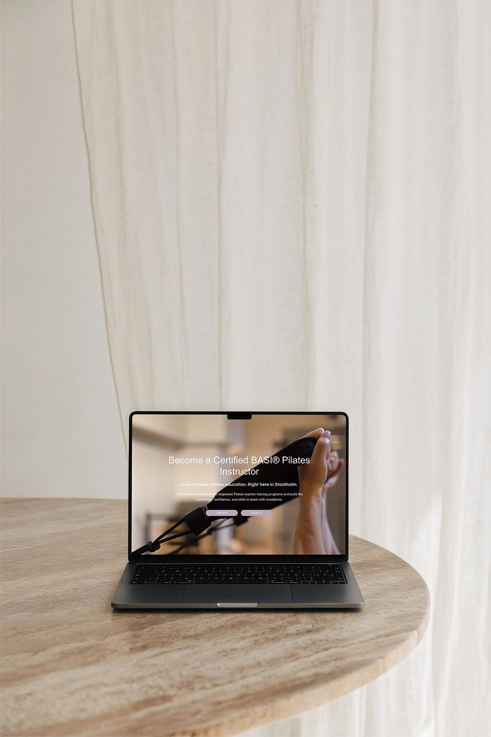 Macbook mockup of pilates flow sthlm website