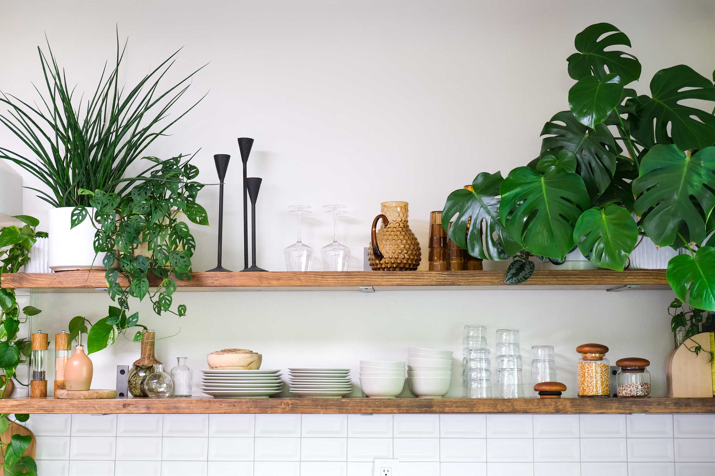Alli's bright and airy kitchen. The open shelving offers a minimalist yet functional design element to the kitchen.