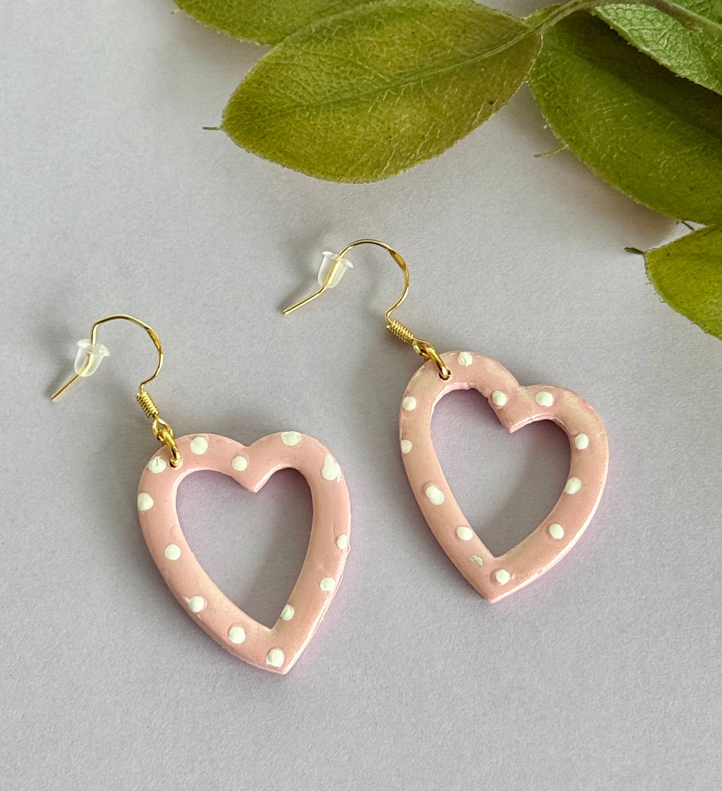 Soft pink polka dot heart earrings