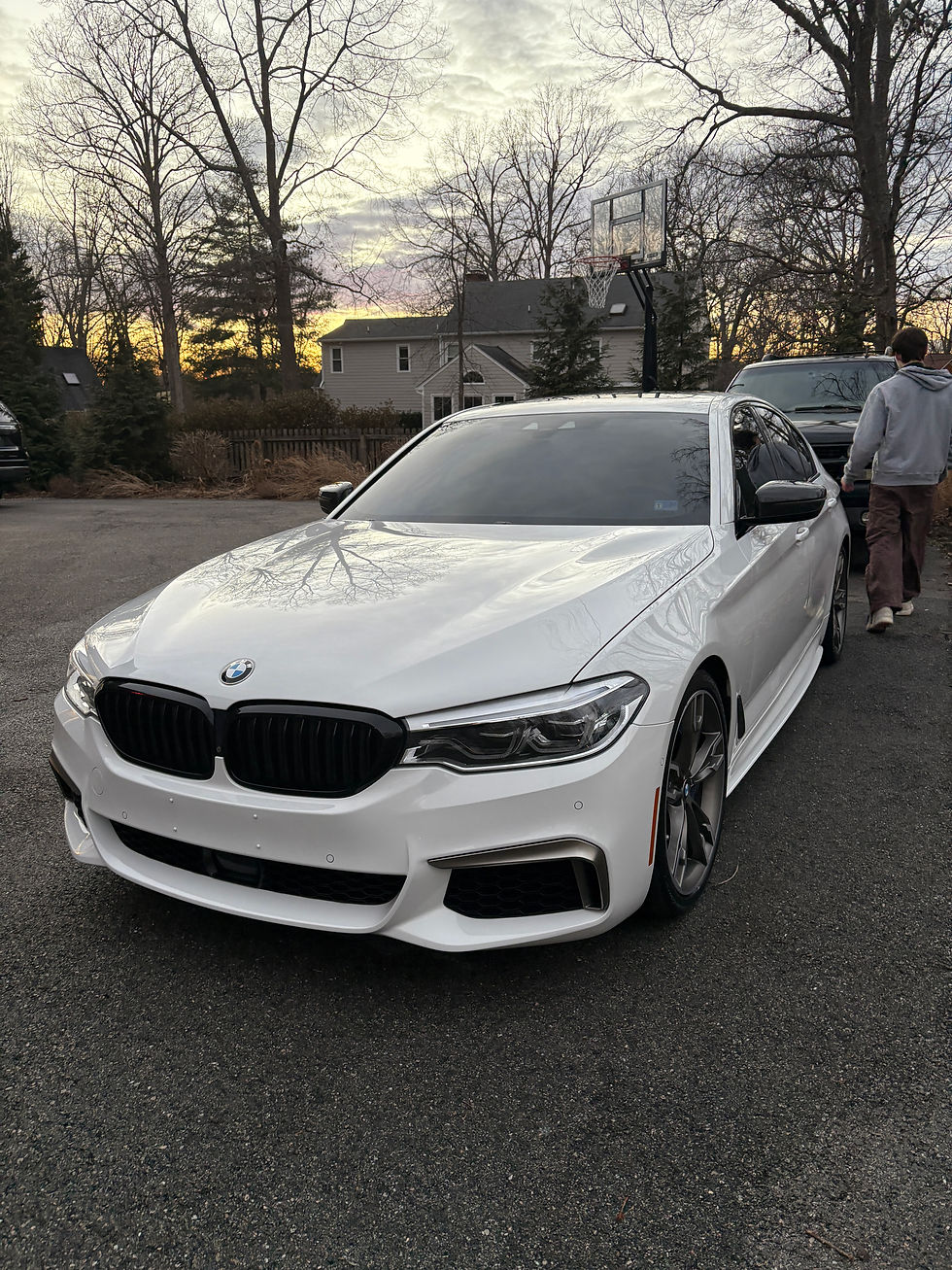 A white BMW sitting in a Midlothian, VA driveway