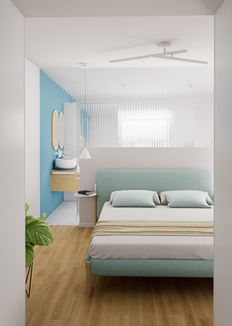 Camera da letto vista dall'armadio, con letto imbottito verde acqua, pareti bianche e azzurre, bagno visibile in fondo con lavabi sospesi e specchi ovali.