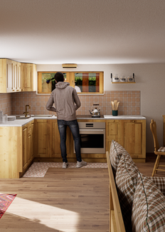 Cucina e zona pranzo in stile rustico alpino con mobili in legno chiaro, piastrelle beige, finestra bassa, panche ad angolo imbottite e pareti decorate con fotografie di montagna e un ragazzo che cucina di spalle.