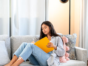 A woman writing a cope-ahead plan