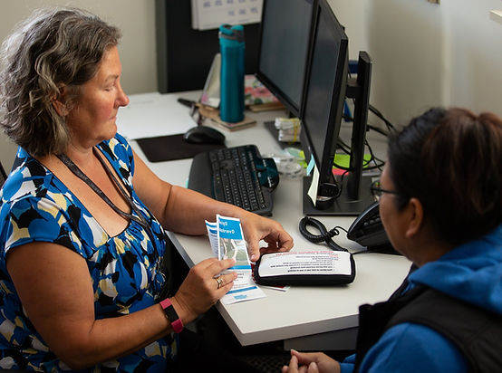 Tribal Opioid Response Provider Showing Patient a Handout