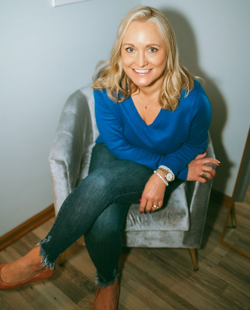 Amanda Kemmel sitting on a chair