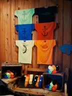 NAUTI BUOY T SHIRT DISPLAY t shirts in colors lime, black, blue, red, yellow, orange