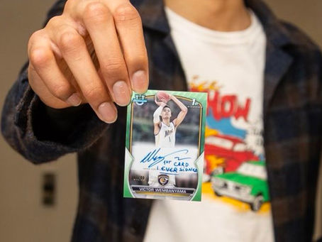 Victor Wembanyama starts to sign his first Bowman cards