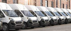 Line of courier trucks DMV Dispatch