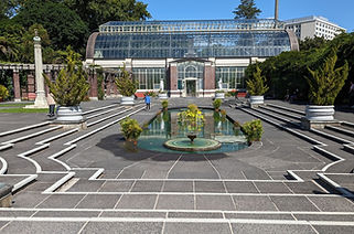 Domain Winter Garden Courtyard and a greenhouse behind.