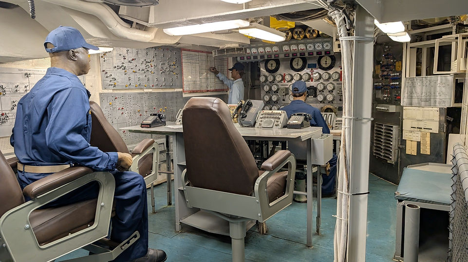 USS Midway Propulsion Control Room with steam pressure gauges and turbine control systems