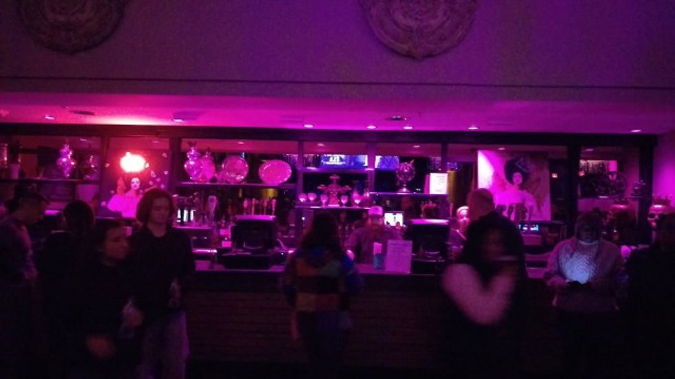 The main bar in the back of the downstairs room.