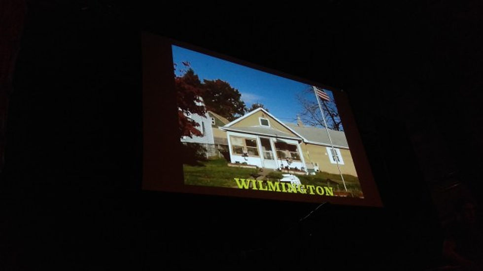 A picture of a small house with the words Wilmington across it.