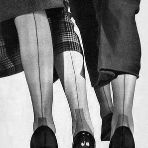 Women wearing seamed retro stockings and classic shoes in a vintage black-and-white photograph illustrating authentic 1940s and 1950s hosiery fashion.