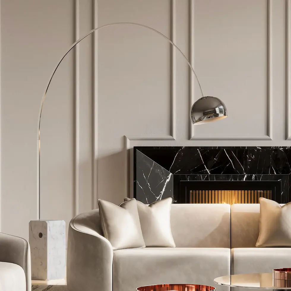 Sleek living room with a light gray curved sofa, white pillows, and a black marble fireplace. A modern silver arc lamp arches above.