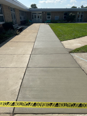 poured concrete sidewalk. Concrete in Livonia