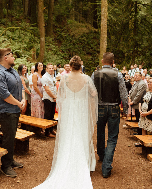 Abigail and Lucas celebrating their Cedar Haven wedding in Sooke BC surrounded by forest and nature