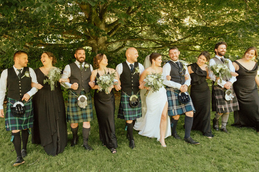 Fiona and Kevin celebrating their Hatley Castle wedding in Victoria BC, including ceremony highlights, portraits, candid moments, and reception celebrations