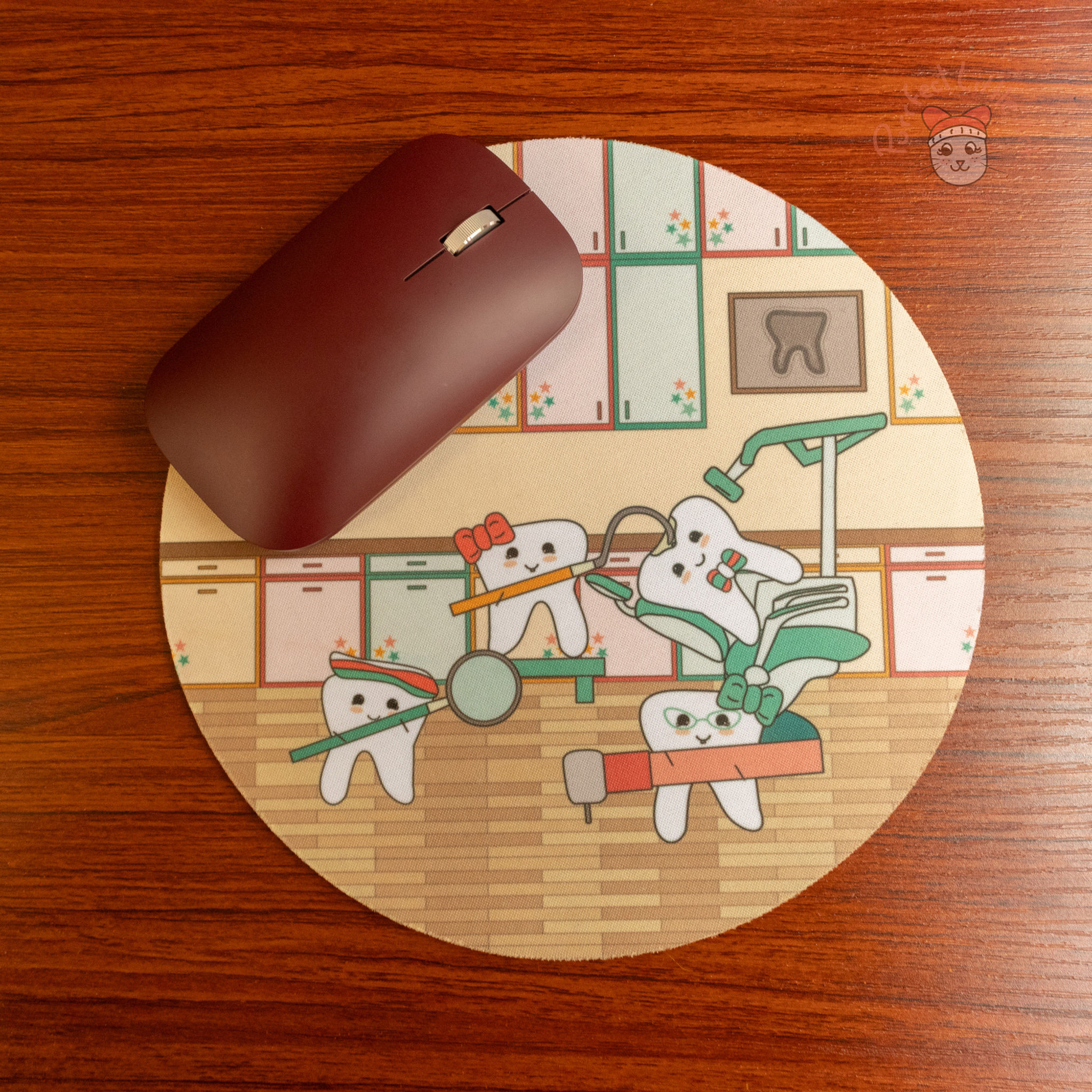 Mousepad of four tooth characters at the dental office laying on a wood desk with a mouse on top