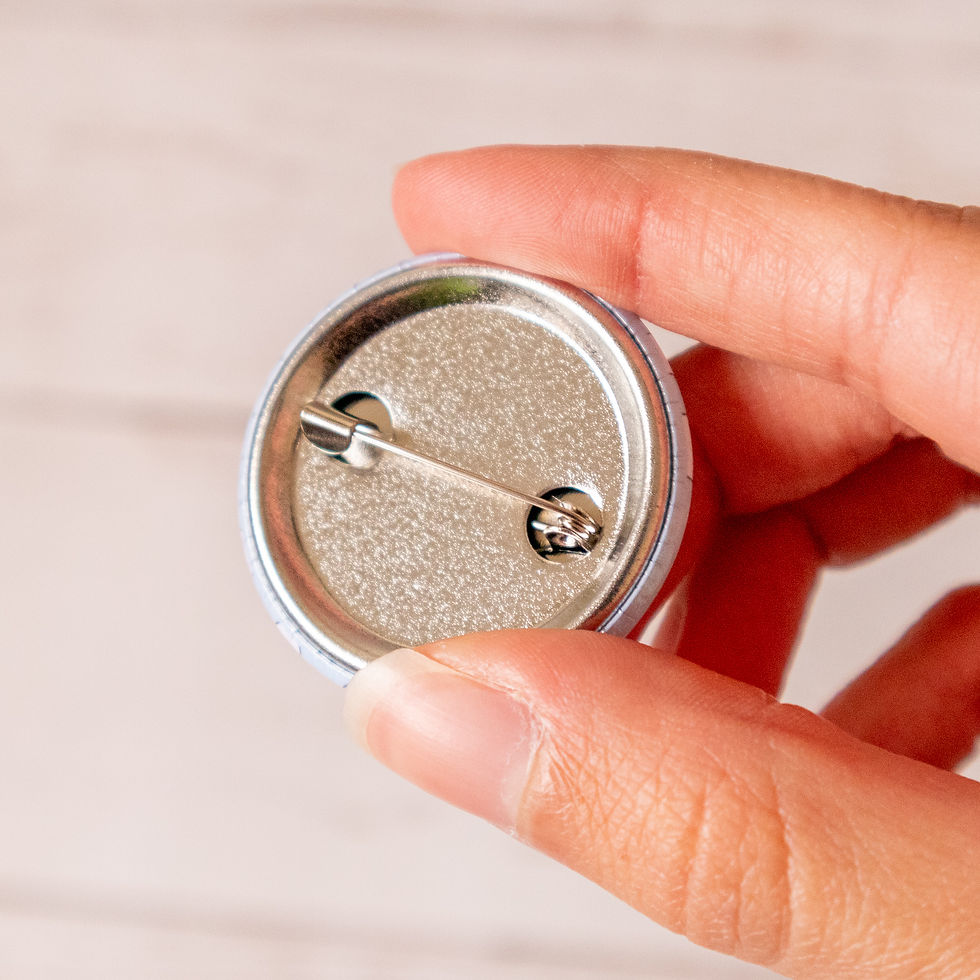 Thumbnail: Back view of a metal button pin