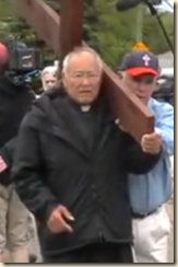 Fr Arrested in protest.png