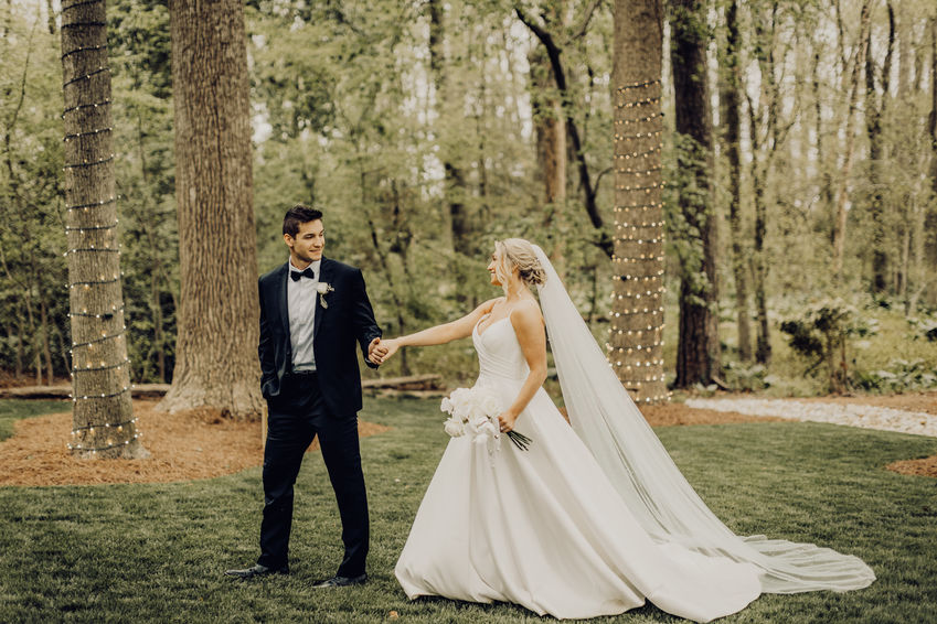 textured bridal bun with cathedral veil