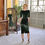 Thumbnail: Classic winter party look in the Lombard Dress in deep green velvet, with split sleeve and flattering waist