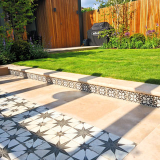 Moroccan inspiration and tile trim detail to outdoor steps
