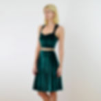 Deep green velvet skirt styled with sweetheart crop top, creating a nature-inspired co-ord ideal for winter parties