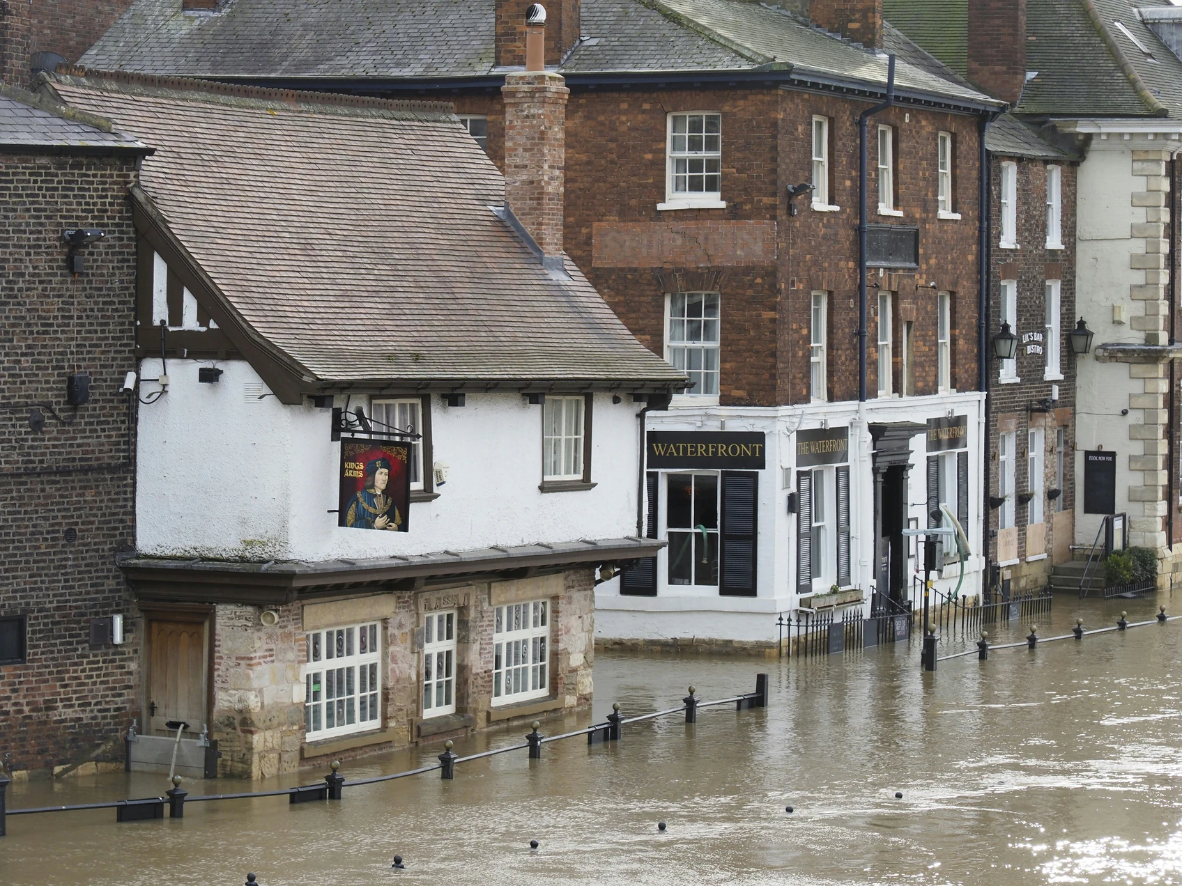 Chest-deep level of flooding in a town