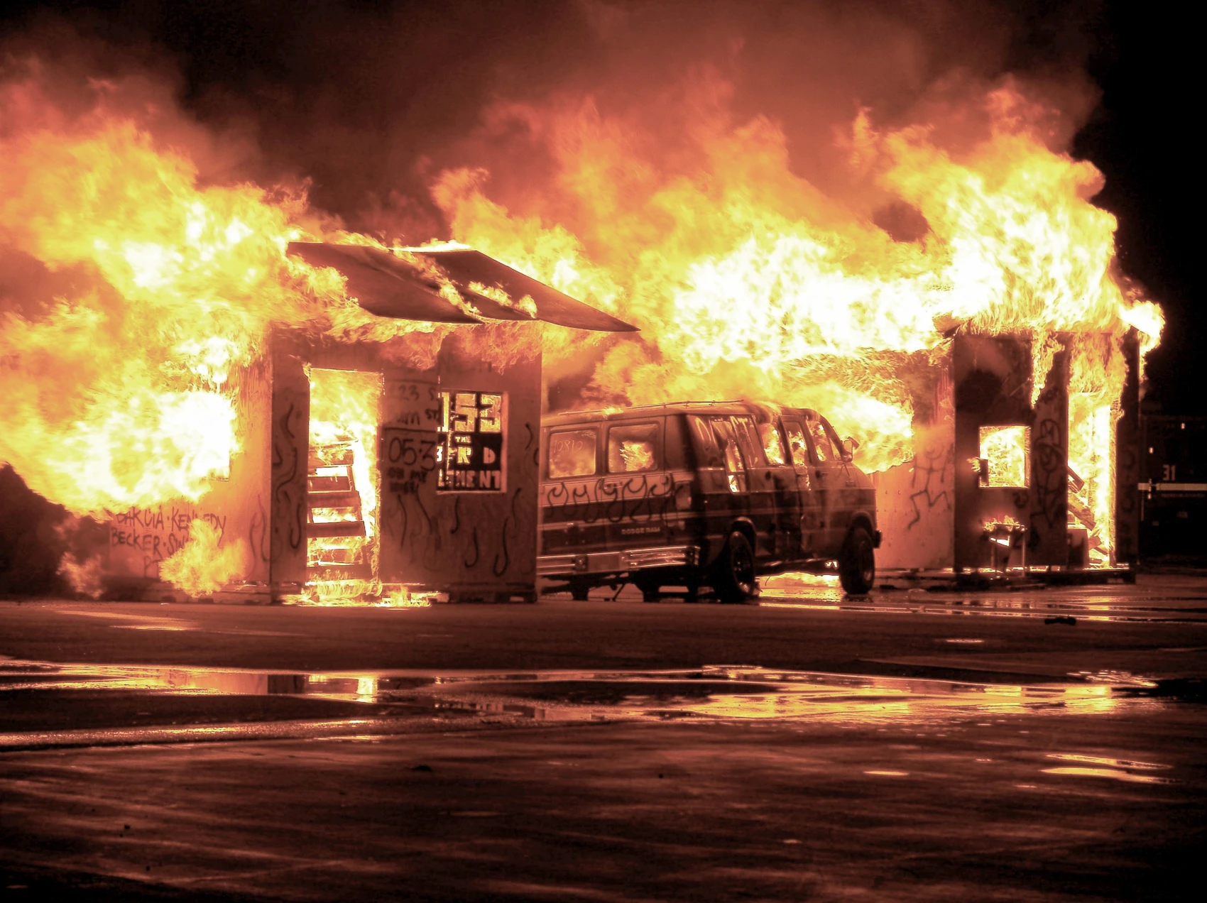a home being eaten by fire
